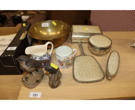 An Eastern brass bowl; a dressing table set; two Poole pottery ornaments; commemorative mug etc. 