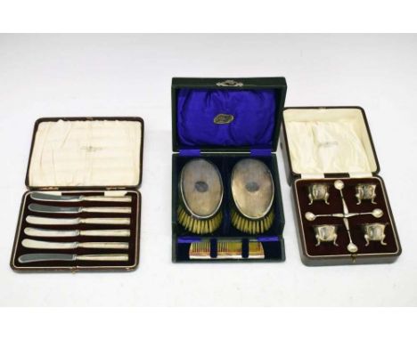 Cased set of George V silver salts, Birmingham 1925, 90g approx, together with a cased silver back brush/comb set and a Georg