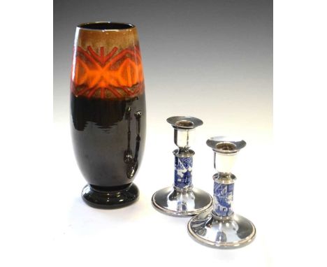 Poole pottery 'Aegean' vase (22cm high), together with a pair of plated candlesticks having blue and white ceramic columns (1