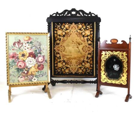 Victorian ebonised and tapestry firescreen with barley twist decoration, 77cm x 109cm (overall), together with two others (3)