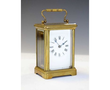 French brass carriage clock, having white Roman dial, 11cm high (ex. handle), with key