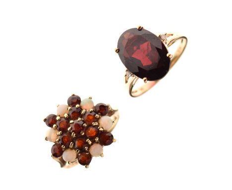 9ct gold garnet and opal dress ring, size M½, and another garnet dress ring, the shank stamped '9k', size P½, 5.9g gross appr