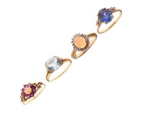 Four various gem set rings, including a 9ct gold opal and diamond cluster ring, size Q½, 12.2g gross approx