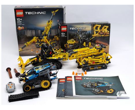 Lego Technic group to include (1) #42094 Tracked Loader; (2) #42097 Compact Crawler Crane, both models have been assembled an