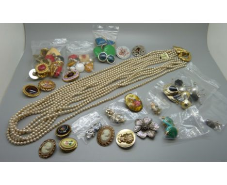 A collection of costume jewellery including a Ciner necklace with tag, clip-on earrings, scarf clips, etc. 