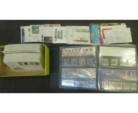 An album of over 100 Royal Mail mint stamps and a box of first day covers 