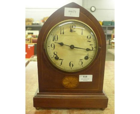 An Edwardian lancet clock with inlaid decoration 