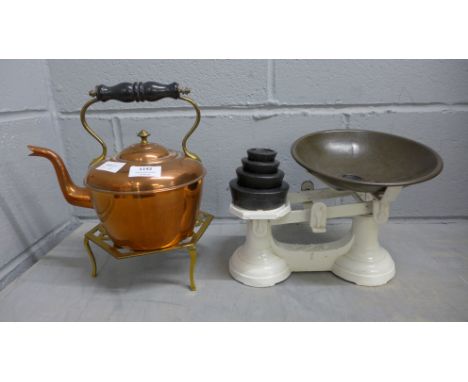A set of scales with weights, a copper kettle and a brass trivet **PLEASE NOTE THIS LOT IS NOT ELIGIBLE FOR POSTING AND PACKI