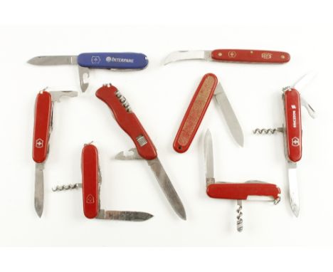 Eight Swiss army knives all by VICTORINOX G+ 