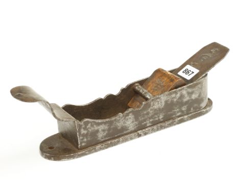 A 17/18c German iron mitre plane 11" x 3" with decoratively shaped sides and scrolled tote (illustrated Russell fig. 795) Pro