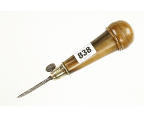 A fine quality horn compendium tool with brass fittings and 4 tools in handle G++