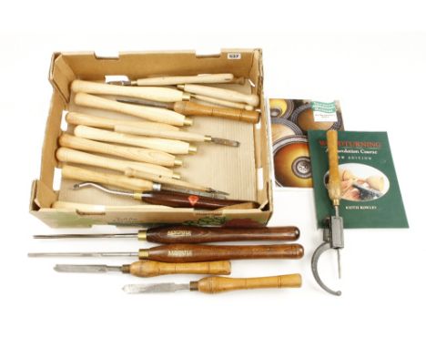 16 turning tools and six new handles, together with a book on turning G+
