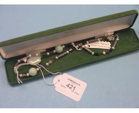 A modern necklace, mounted with pale jade, tourmaline, silver and pearls