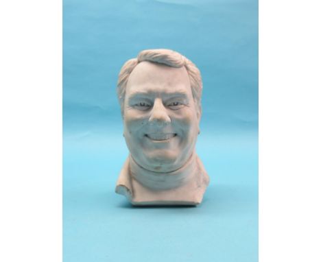 A white marble portrait bust, smiling male, 13in.