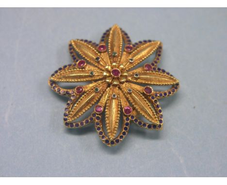 An 18ct. gold ruby, sapphire and emerald brooch, star-design, 22.5 grams gross total