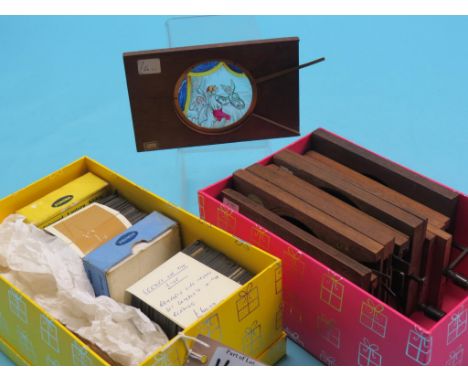 A group of twelve Victorian mechanical magic lantern slides, some comical subjects, and a collection of 3in. magic lantern sl