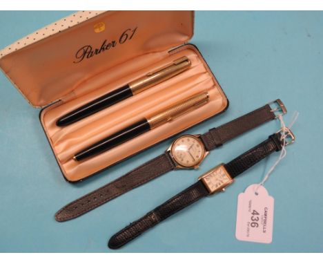 A gentleman's 9ct. gold wristwatch, Goldsmiths & Silversmiths Co., with subsidiary seconds, engraved presentation inscription