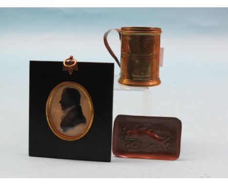 A Victorian silhouette portrait, gentleman in profile, in original frame, and a small Newlyn copper rectangular dish, embosse