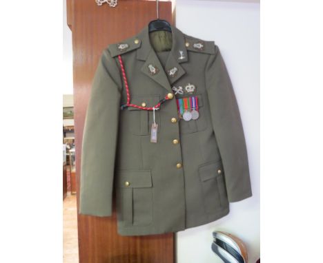 An army band two-piece uniform, three WWII medals attached