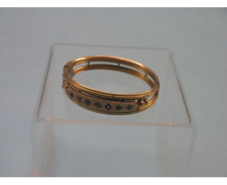 A 9ct. gold bangle, set sapphire and diamond chips, 13.6 grams gross total