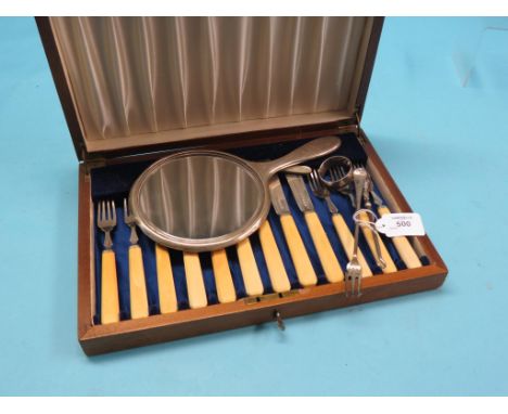 A set of six silver fish knives and forks, with bone handles, Sheffield 1946, together with an engine-turned silver hand mirr