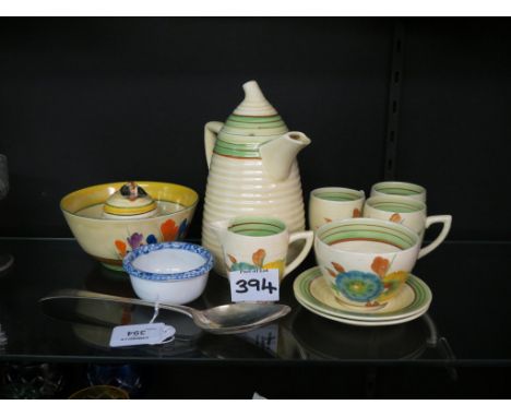 A Clarice Cliff beehive honey pot, Crocus pattern, similar finger bowl, further Clarice Cliff-style tea ware, Hester Bateman 