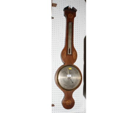An early 19th Century wheel barometer in mahogany case decorated shell and flower head marquetry panels, silvered dial inscri