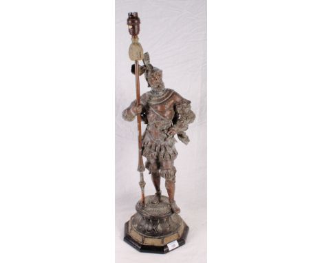 A bronzed figure of a 16th Century Swiss mercenary fitted as a table lamp, 28" high