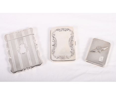 A white metal card case with engine turned decoration, a silver match book holder with RAF wings and an embossed silver card 