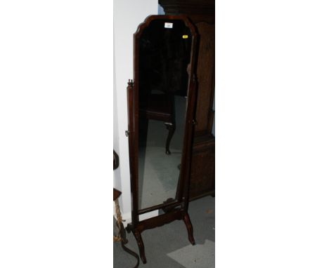 A polished as mahogany cheval dressing mirror