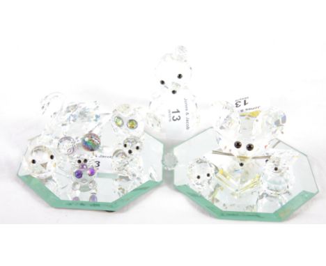 Eight Swarovski facetted glass animals, a similar model of a mouse and two glass mirror stands