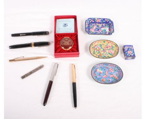 A Bilston & Battersea enamel pill box, three Chinese enamelled dishes, a matching matchbox sleeve, three fountain pens, a pro