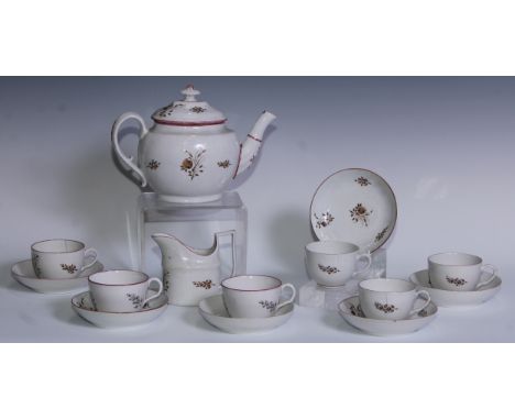 A Coalport part tea service, comprising boat shaped teapot, cream jug, six cups and saucers, each decorated in sepia with fol