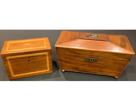 A Georgian mahogany sarcophagus tea caddy, 29.5cm wide; another, rectangular (2) 