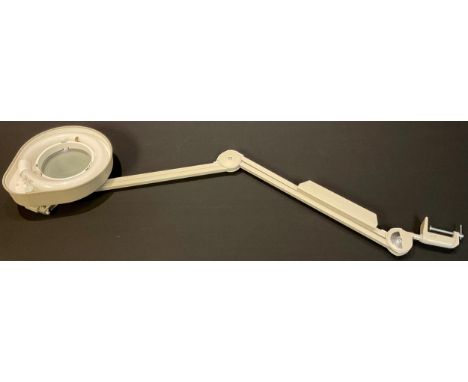 An Anglepoise style magnifying lamp, One Thousand And One Lamps Ltd 