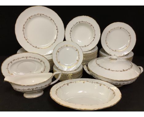 A Royal Worcester Gold Chantilly pattern dinner service, for eight, comprising dinner plates, dessert plates, side plates, bo
