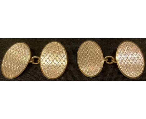 A pair of 9ct gold oval engine turned cuff links, the reverse engraved, June 1st 1938, Chester hallmark, 7.2g, original Harro