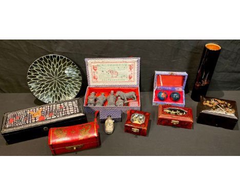 A Japanese reverse painted erotica snuff bottle, 7cm, boxed; a Japanese decorative plate, boxed; a black lacquer vase and sta