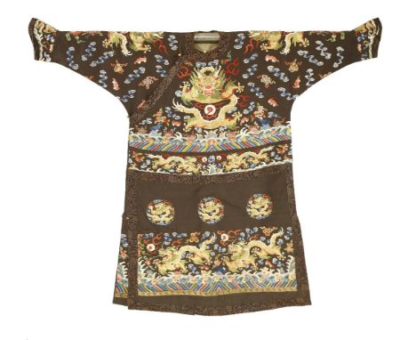 A Chinese embroidered summer robe,c.1900, embroidered with dragons in gold thread chasing a flaming pearl above waves, surrou