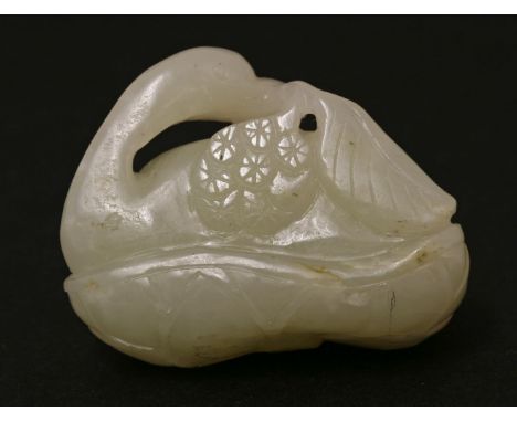A Chinese jade carving,of a goose on a lotus leaf, holding a sprig of flowers in its mouth,5cm long玉雕鹅把件