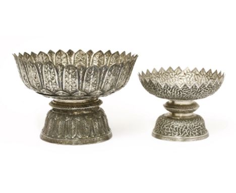 Two silver stem bowls,19th century, each of circular form with a spiky rim, on a circular domed base,one decorated with flore