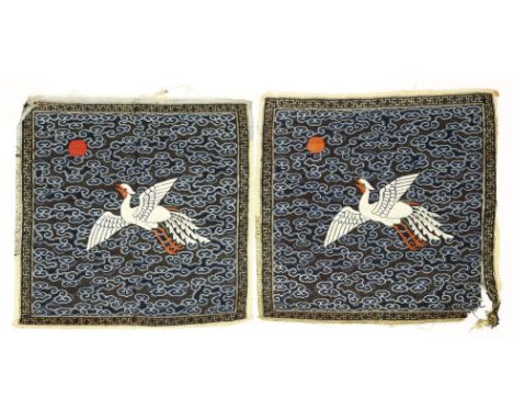 A pair of Chinese kesi rank badges,Qing dynasty (1644-1911), of the fifth civil rank, with the silver pheasant in white, surr