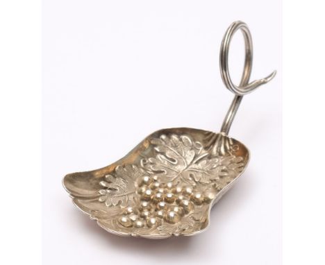 A William IV  silver caddy spoon, maker Taylor & Perry, Birmingham, 1835: the shell-shaped bowl with grape and vine leaf deco