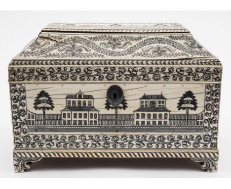 An Anglo-Indian stained ivory tea caddy: decorated on each side with colonial buildings in landscapes within foliate borders,