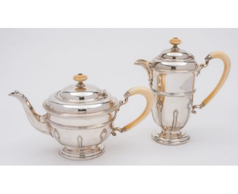 A George V silver two-piece tea service, maker Frank Cobb & Co Ltd, Sheffield, 1933: of ovoid form with strap work decoration