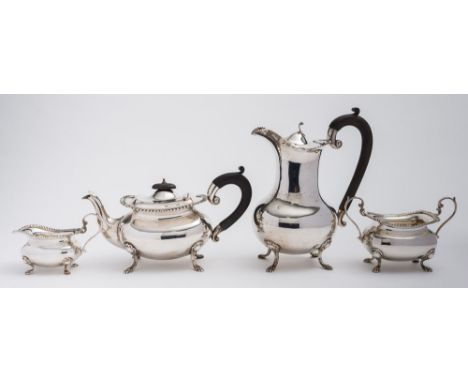 A matched silver four-piece tea service, maker Walker and Hall, Birmingham, 1917/18, the sugar basin, Sheffield, 1896: of bar