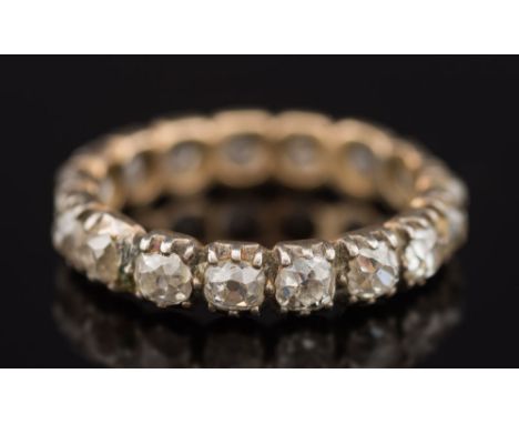 A 19th century-style diamond eternity ring: with seventeen round old brilliant-cut diamonds estimated to weigh a total of 1.5