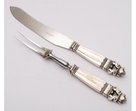A Georg Jensen Acorn pattern carving knife and fork: stamped marks to handles with steel blade and tines