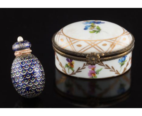 An Imperial Russian polychrome enamelled silver, gold and seed-pearl mounted ovoid scent flask: decorated all over with gold 