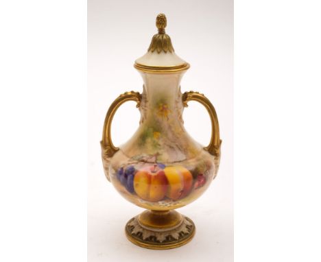 A Royal Worcester two-handled pedestal vase and a cover painted by William Ricketts: with peaches, grapes and blossom, signed